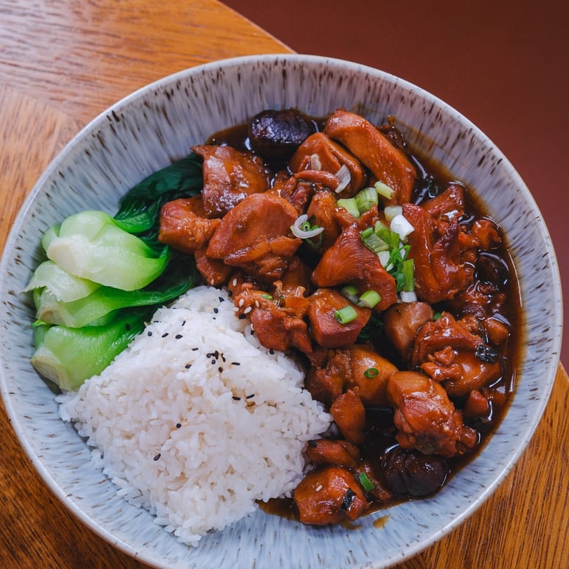 Reren Lamen n Bar's chicken and mushroom dish with white rice and bok choy.